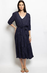 Navy viscose midi dress with metallic stripes, button front and tiered skirt – modern French wardrobe by Volange Paris.