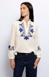 off white cotton blouse with blue floral embroidery Feminine white with cuff and button details – Timeless French styling from Volange Paris