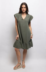 Olive cotton dress with textured waffle fabric, a ruffled neckline, flutter sleeves and flounced hem – Volange Paris, Parisian fashion in Sydney (Mosman, Paddington and Bronte) or Australia-wide online.