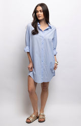Pale blue cotton shirt dress with a relaxed fit, button-down front, side pockets and curved hem. 100% cotton – Volange Paris, Parisian fashion in Sydney (Mosman, Paddington and Bronte) or Australia-wide online.