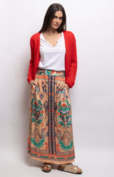 Peach print maxi skirt in soft flowing modal with an elasticated waist, side pockets and decorative border detailing – Volange Paris, Parisian fashion in Sydney (Mosman, Paddington and Bronte) or Australia-wide online.

