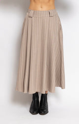 Beige pinstripe midi skirt with a flowing A-line silhouette, elasticated waistband and elegant drape for effortless everyday dressing – Volange Paris, Parisian fashion in Sydney (Mosman, Paddington and Bronte) or Australia-wide online.
