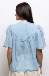 Powder blue cotton blouse with floral embroidery, broderie anglaise, lace inserts and scalloped collar – Volange Paris, Parisian fashion in Sydney (Mosman, Paddington and Bronte) or Australia-wide online.