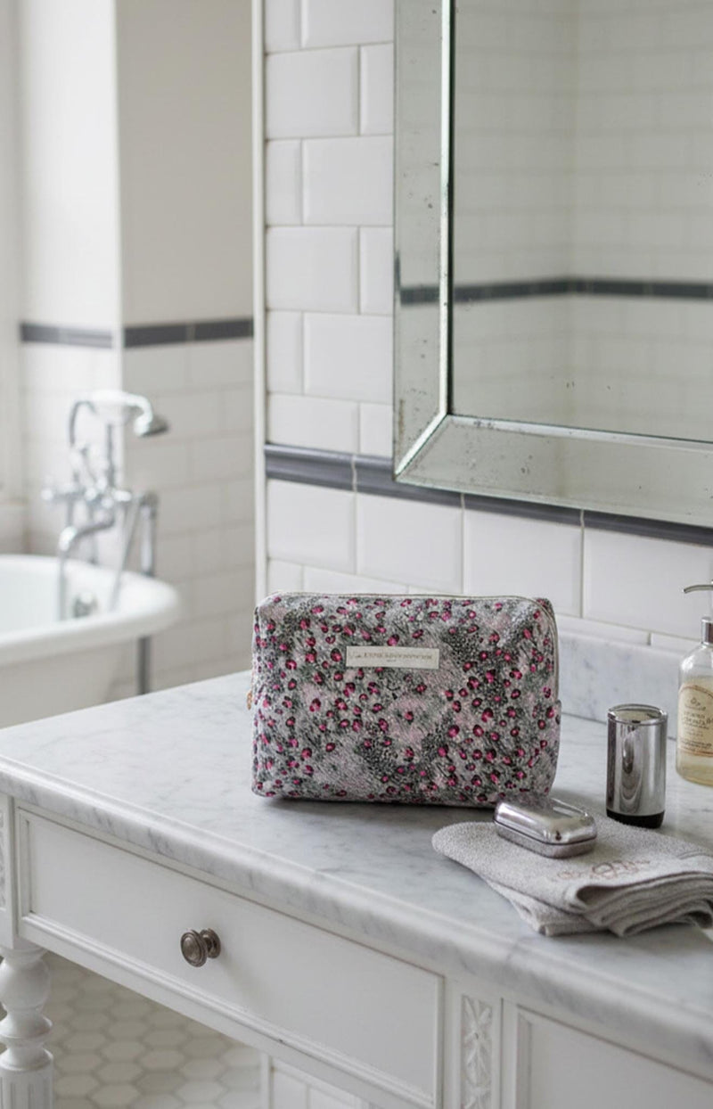 Block Printed pink and purple padded cotton toiletry bag with zip closure – Parisian travel essential by Volange Paris.