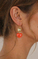 Red heart drop earrings with gold detail and vibrant resin finish – Parisian elegance by Volange Paris, French jewellery in Sydney (Mosman, Paddington and Bronte) or Australia-wide online.