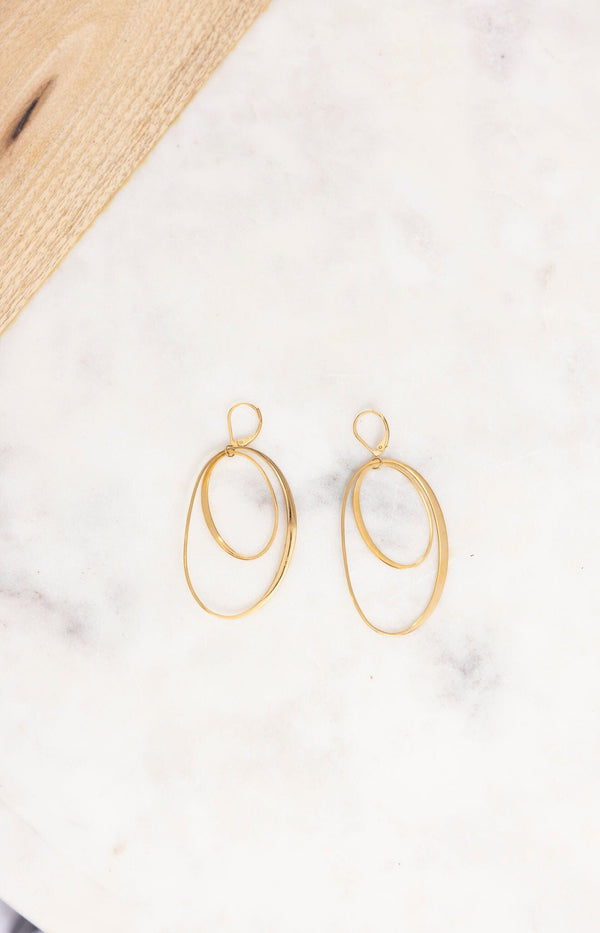 Oversized gold sculptural earrings – Statement French jewellery from Volange Paris