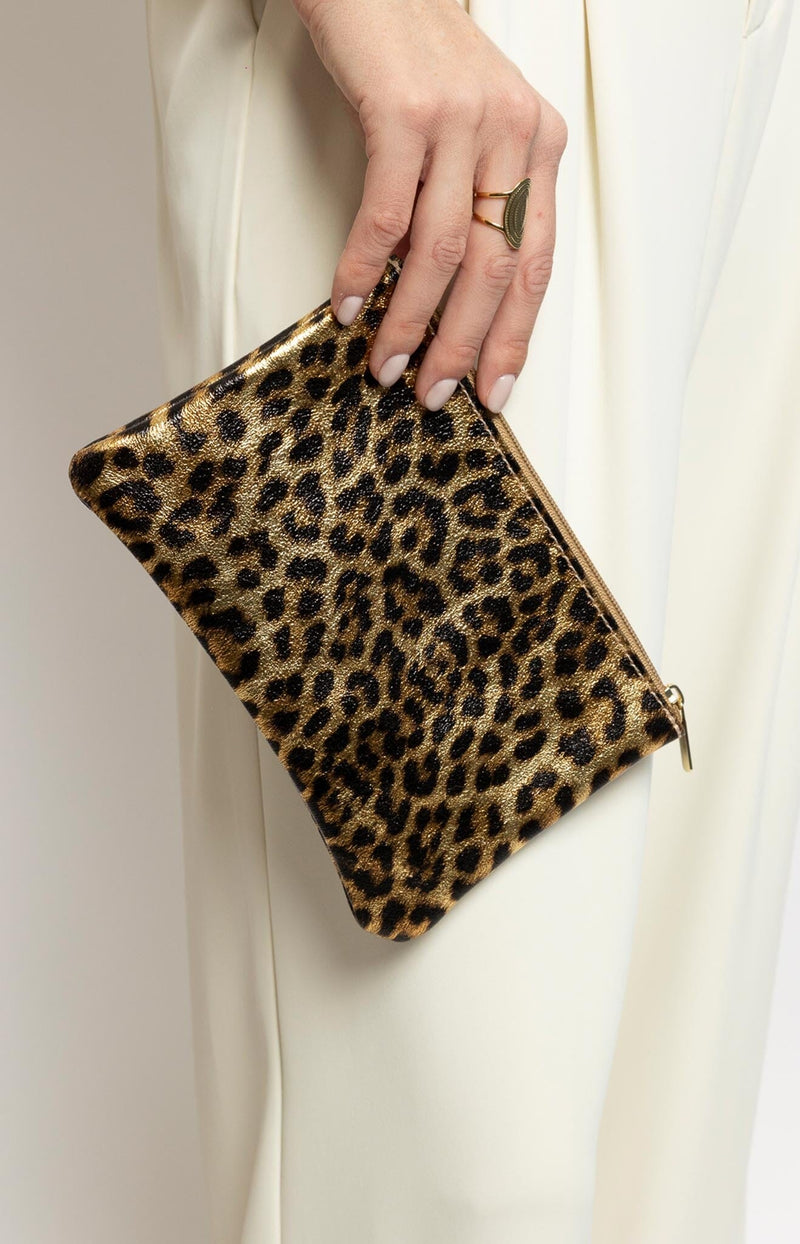 Shiny sparkly leopard-print leather pouch with gold zip  Made in Italy – Parisian chic by Volange Paris.