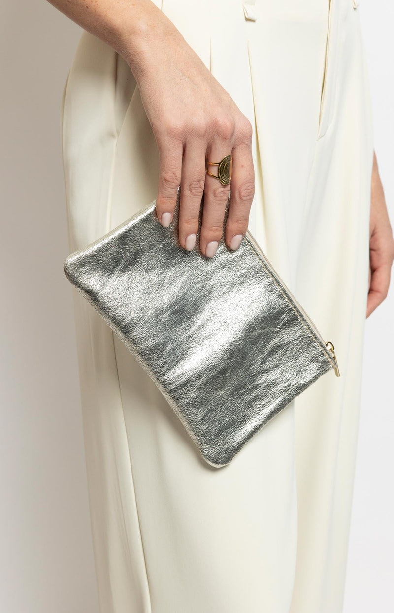 Shiny sparkly platine leather pouch with gold zip  Made in Italy – Parisian chic by Volange Paris.