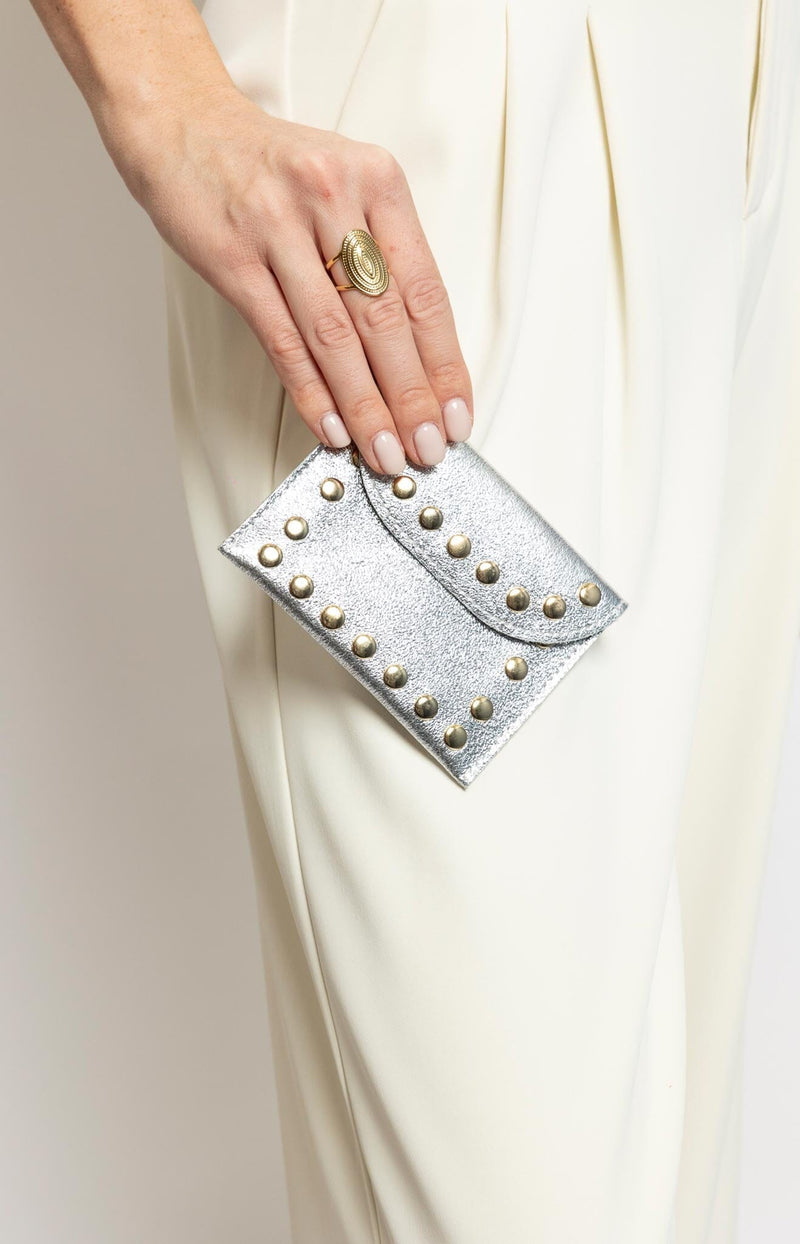 silver leather coin purse with gold stud detailing and snap closure Made in Italy – Parisian chic by Volange Paris.