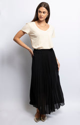 Black pleated skirt with a flowy silhouette – Elegant French fashion piece from Volange Paris