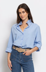 Sky blue cotton blouse with an elegant ruffle collar and relaxed silhouette for effortless everyday style – Volange Paris, Parisian fashion in Sydney (Mosman, Paddington and Bronte) or Australia-wide online.