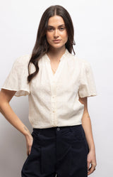 Soft ivory blouse in 100% cotton with floral embroidery, broderie anglaise detailing and flutter sleeves – Volange Paris, Parisian fashion in Sydney (Mosman, Paddington and Bronte) or Australia-wide online.