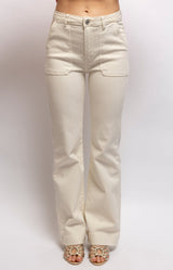 Soft off-white high-rise jeans with a straight-leg fit, front patch pockets and comfortable stretch – Volange Paris, Parisian fashion in Sydney (Mosman, Paddington and Bronte) or Australia-wide online.