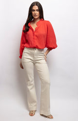 Soft off-white high-rise jeans with a straight-leg fit, front patch pockets and comfortable stretch – Volange Paris, Parisian fashion in Sydney (Mosman, Paddington and Bronte) or Australia-wide online.