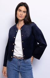 Structured short blue jacket with modern tailoring – Parisian chic outerwear from Volange Paris
