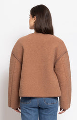 Soft tan teddy jacket with a relaxed silhouette, button-front closure and cosy textured finish for effortless winter layering – Volange Paris, Parisian fashion in Sydney (Mosman, Paddington and Bronte) or Australia-wide online.
