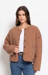 Soft tan teddy jacket with a relaxed silhouette, button-front closure and cosy textured finish for effortless winter layering – Volange Paris, Parisian fashion in Sydney (Mosman, Paddington and Bronte) or Australia-wide online.