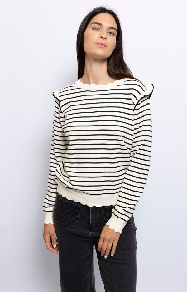 Black and white striped knit frilled shoulders scalloped edges, elegant Parisian twist – French fashion by Volange Paris.