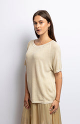 Gold shimmer knit top with round neck, short sleeves, and relaxed fit – Luxurious touch by Volange French Fashion.