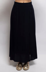 Navy maxi skirt in lightweight viscose with a flowing shape, fitted waistband and elegant side split – Volange Paris, Parisian fashion in Sydney (Mosman, Paddington and Bronte) or Australia-wide online.