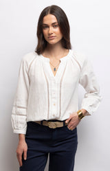 White cotton blouse with delicate openwork lace, softly gathered neckline and relaxed silhouette for effortless elegance – Volange Paris, Parisian fashion in Sydney (Mosman, Paddington and Bronte) or Australia-wide online.