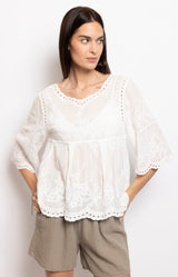 White cotton lace embroidered blouse with 3/4 sleeves – Parisian elegance by Volange Paris.