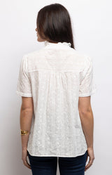 White cotton blouse with delicate floral embroidery, ruffled stand-up collar and feminine frill detailing – Volange Paris, Parisian fashion in Sydney (Mosman, Paddington and Bronte) or Australia-wide online.