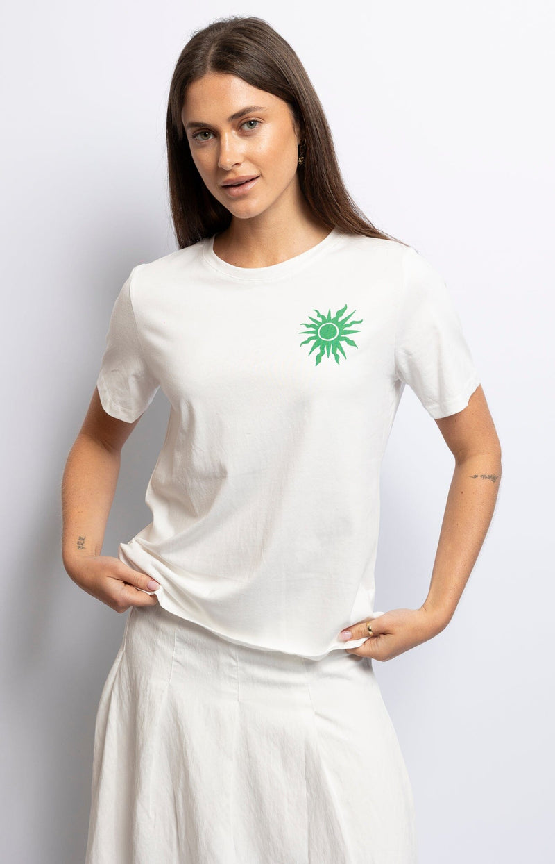 Breezy white organic cotton tee featuring green sun graphic and intricate tropical back print – Sunny Parisian fashion by Volange Paris.