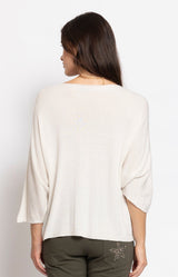 white lightweight knit top with crystal star detail and wide neckline by Volange Paris, Parisian elegance in Sydney.