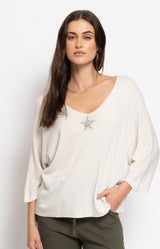white lightweight knit top with crystal star detail and wide neckline by Volange Paris, Parisian elegance in Sydney.